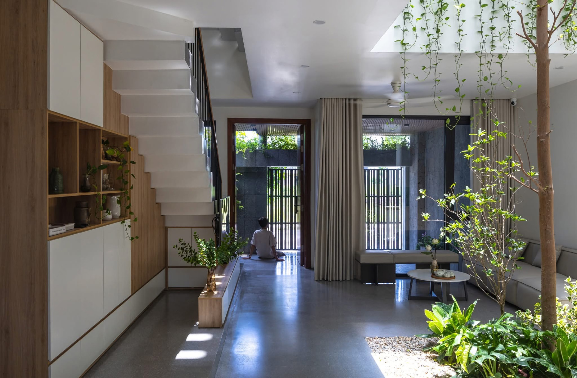 Living room looking towards the entrance and garden court