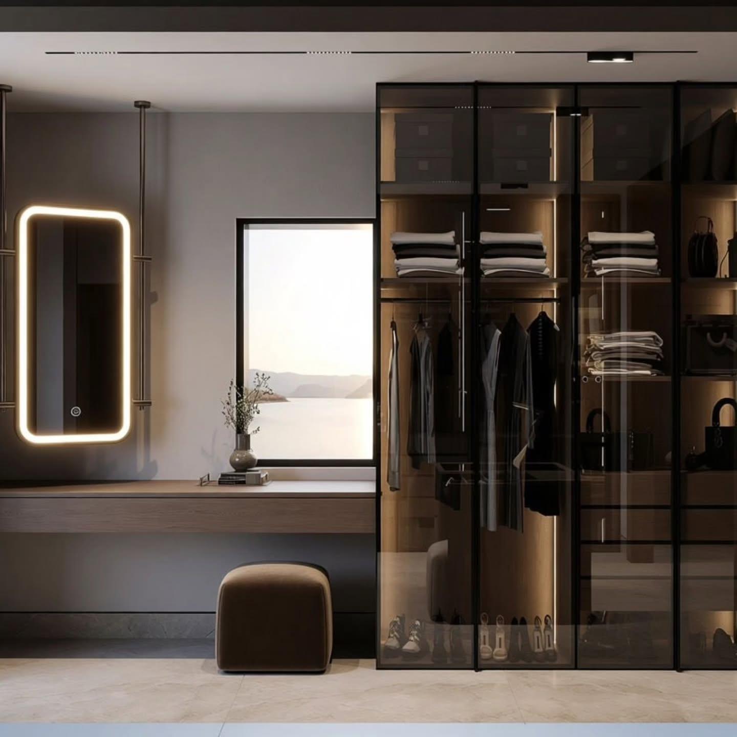 Dressing desk with a lit mirror framed by a window onto the landscape
