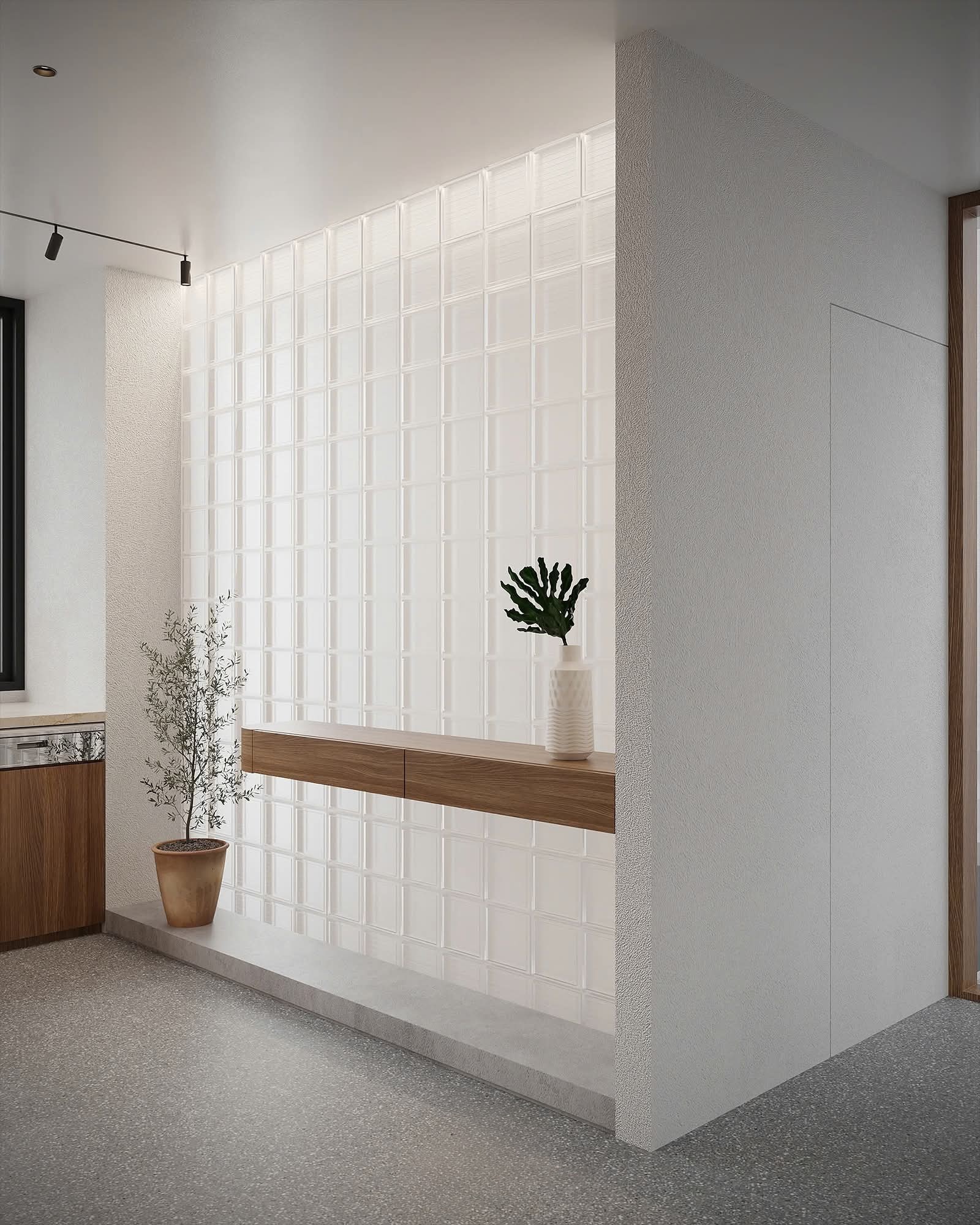Foyer with a glass-block wall and floating oak console