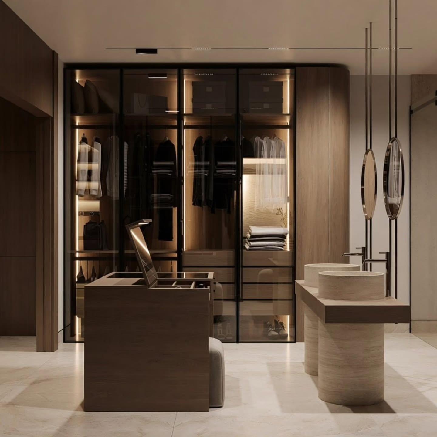 Vanity with twin stone basins, suspended round mirrors and glass wardrobes