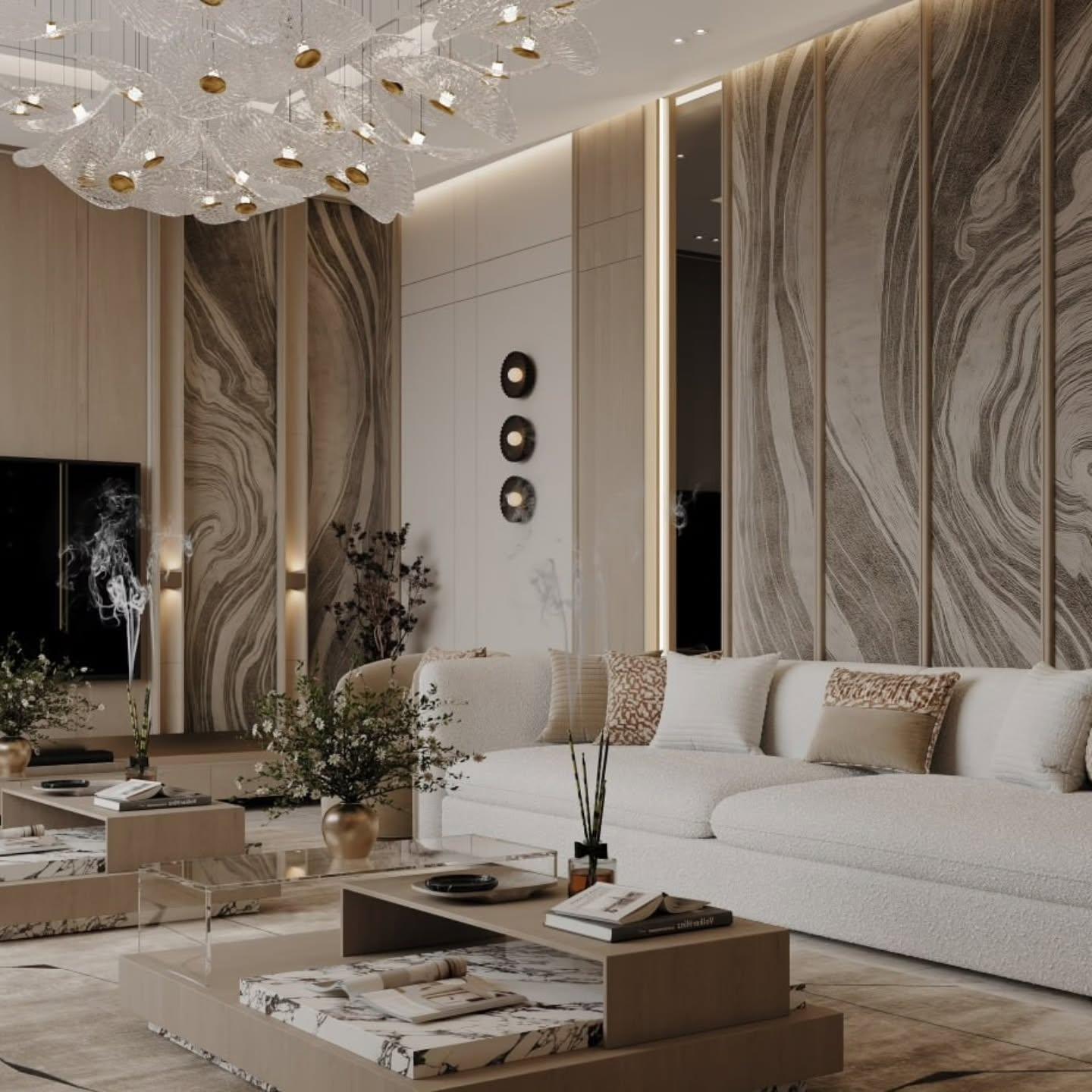 Wide living view across relief panelling, sconce trio and a tiered marble table