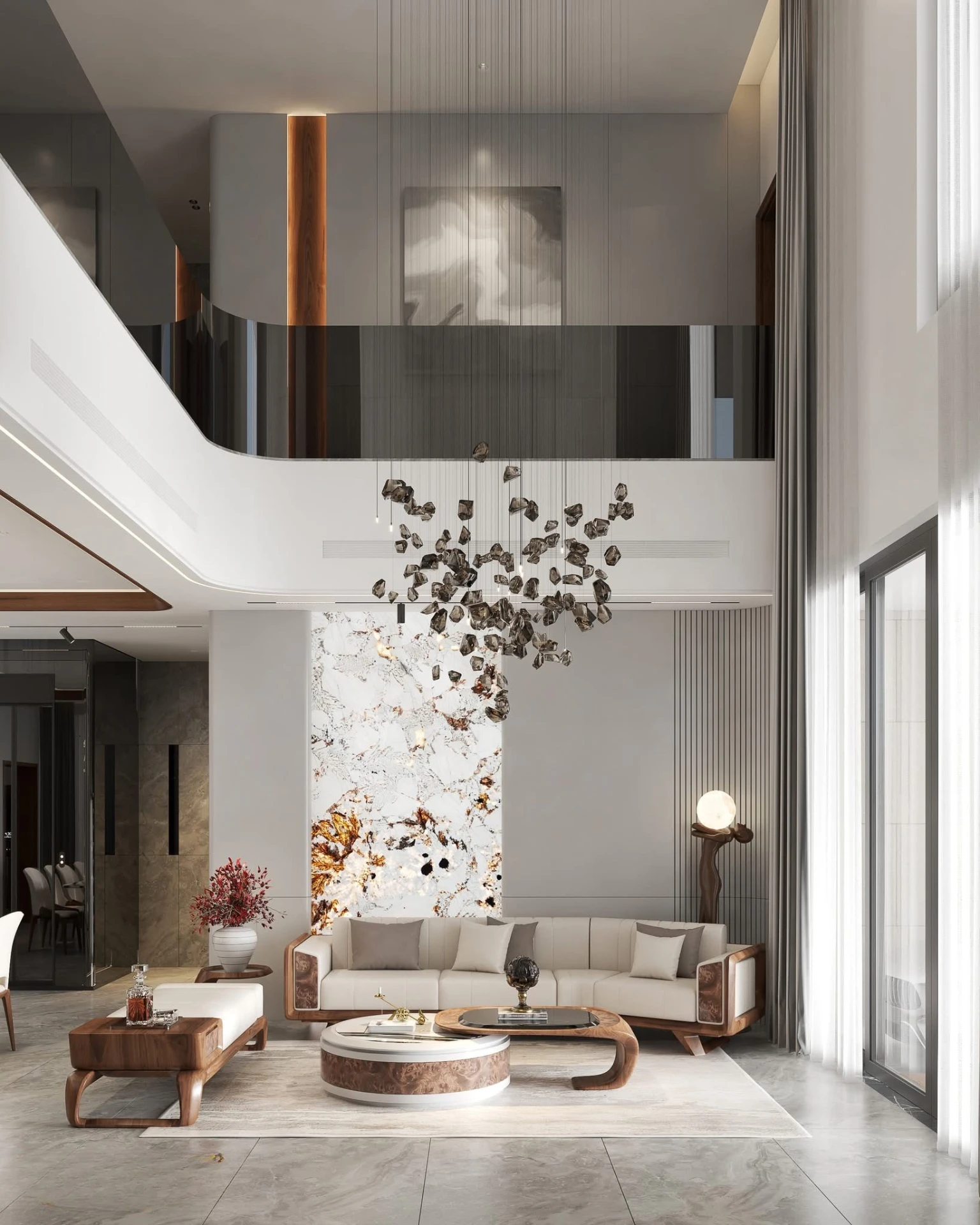 Living room double-height view with mezzanine, chandelier and floor-to-ceiling curtains