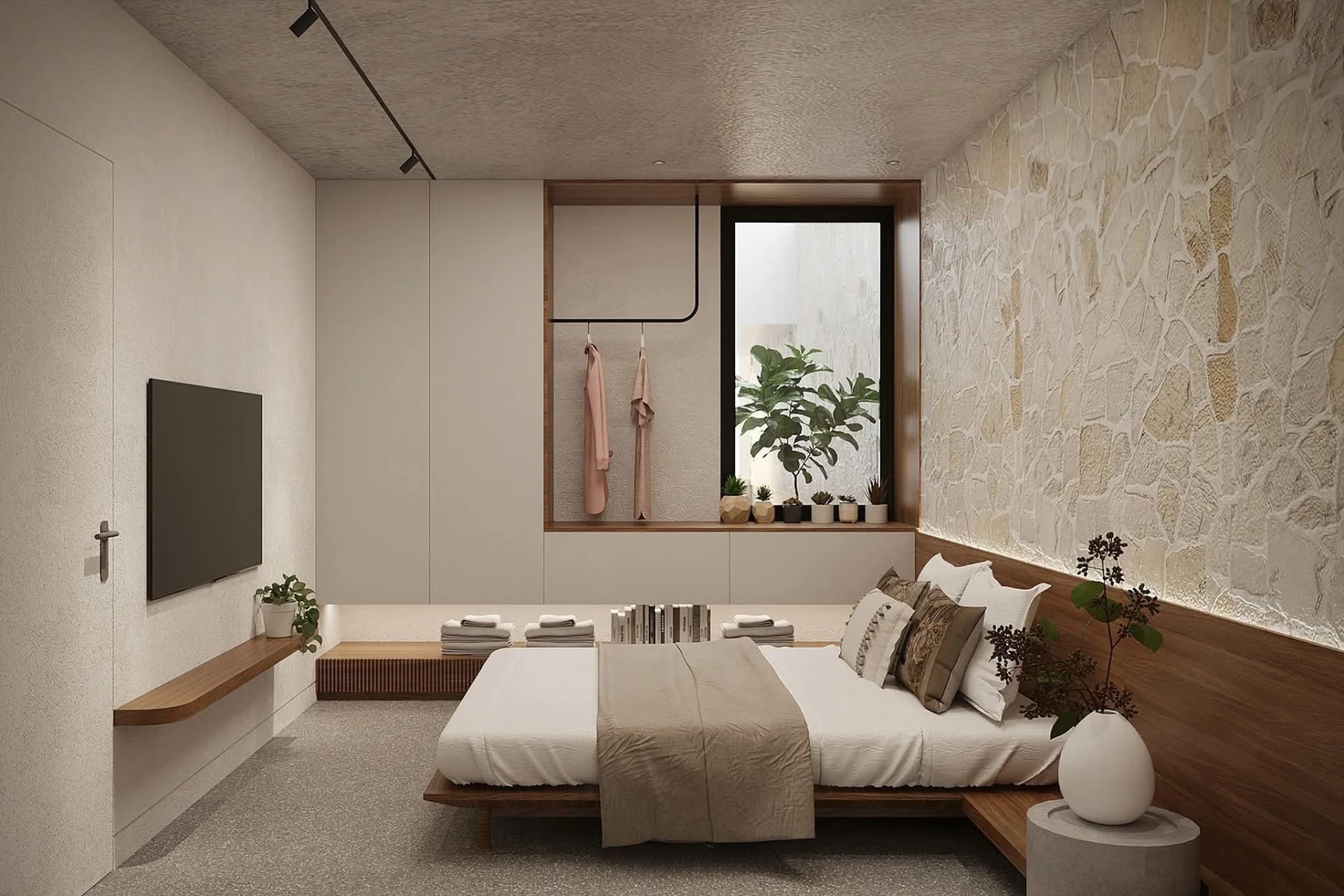 Guest bedroom with window seat, wardrobe wall and stone return